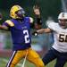 Ypsilanti junior quarterback Jaavaid Love throws for a touchdown in the first half against Saline High School on Friday. The Saline Hornets defeated Ypsilanti 49-14. Daniel Brenner I AnnArbor.com